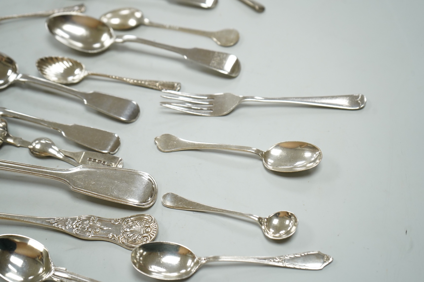 A collection of assorted Victorian and later silver flatware, various patterns, dates and makers, 17.2oz.